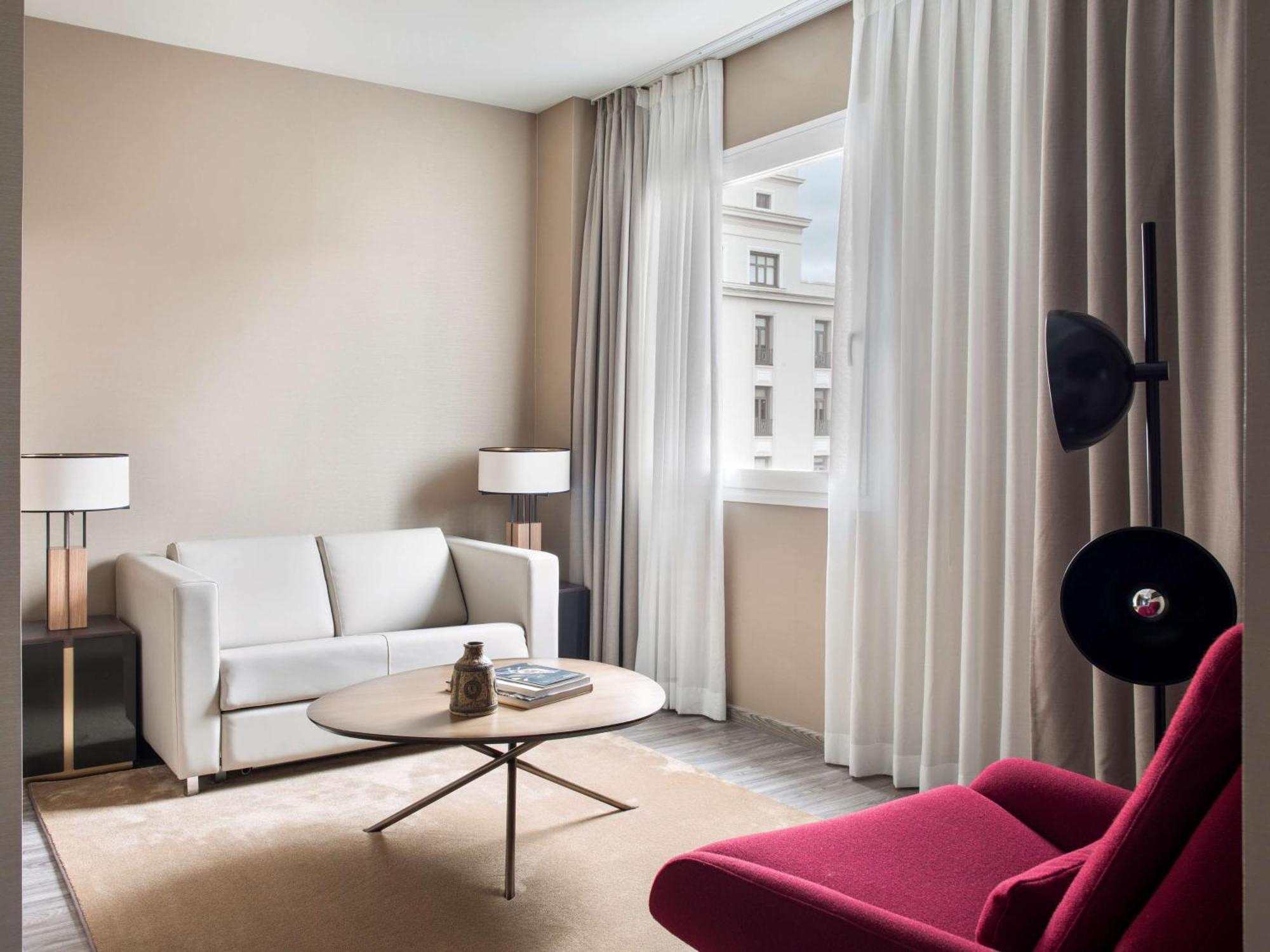 Nh Collection Madrid Suecia Otel Dış mekan fotoğraf A living room at the hotel